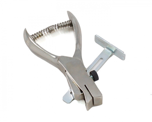 Hand held slot punch with adjustable guide